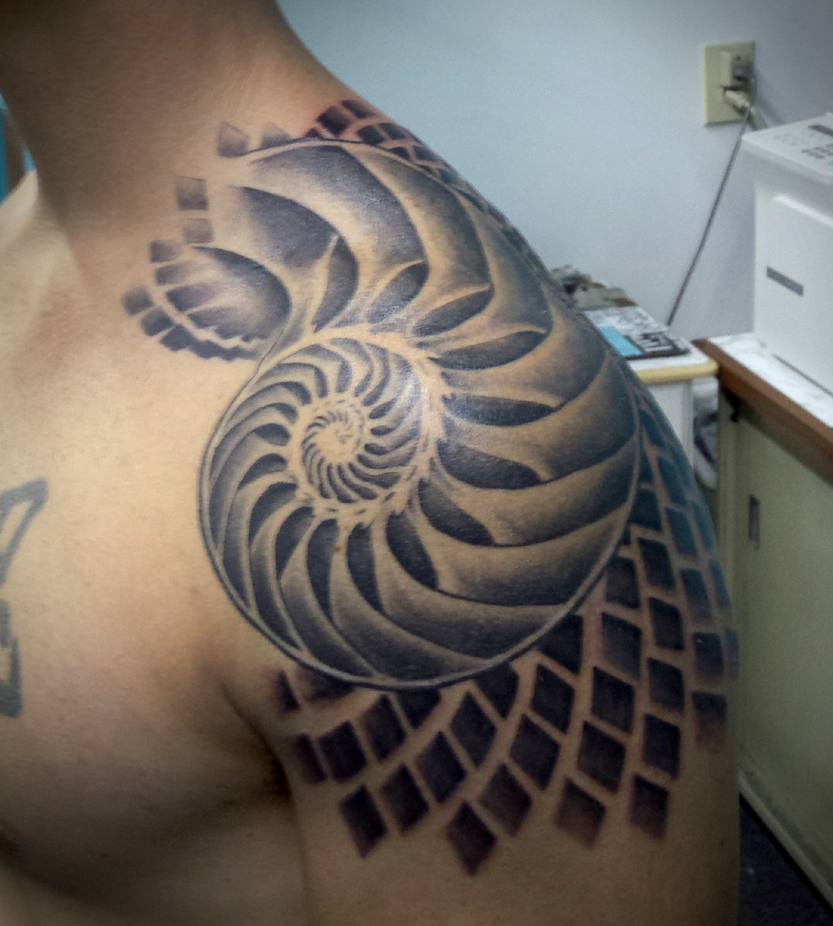Shoulder tattoo of design