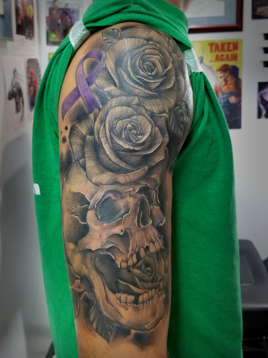 Arm tattoo of flowers