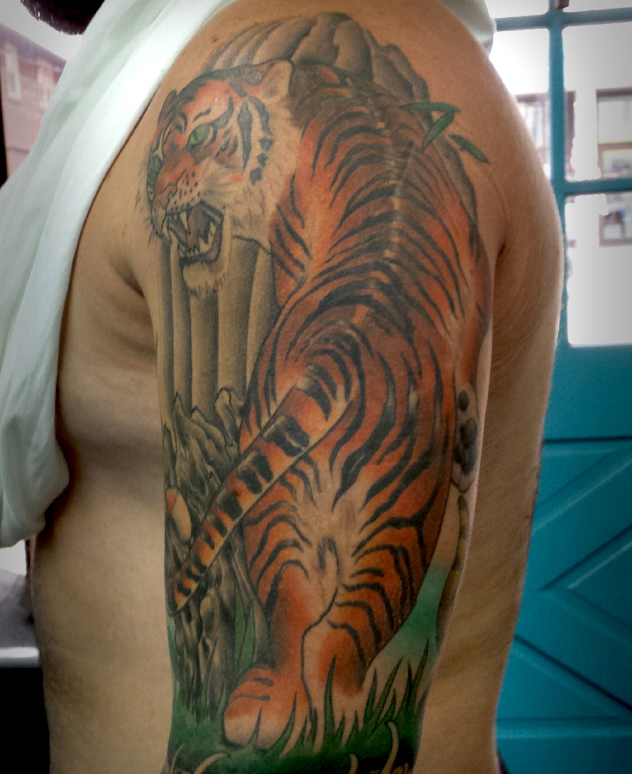 Arm tattoo of animal